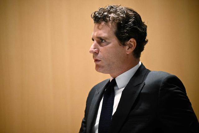 French actor Gerard Depardieu's lawyer Jeremie Assou arrives to Paris courthouse to attend the verdict in the sexual assault trial of the French cinema icon in Paris, on May 13, 2025. Gerard Depardieu faces a possible 18-month suspended prison sentence for the alleged sexual assault of two women on a 2021 movie set -- charges he denied during the closely watched trial. (Photo by JULIEN DE ROSA / AFP)