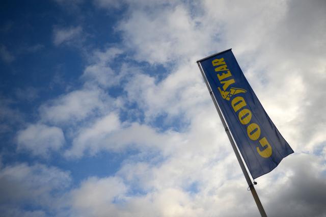 (FILES) A flag of US tyre manufacturer Goodyear is pictured on January 31, 2013 in Rueil-Malmaison, out of Paris. Goodyear, suspected of concealing the defects in some of its tires that led to fatal accidents, has been summoned to appear before an examining magistrate in Besançon on May 13, 2025. (Photo by Martin BUREAU / AFP)