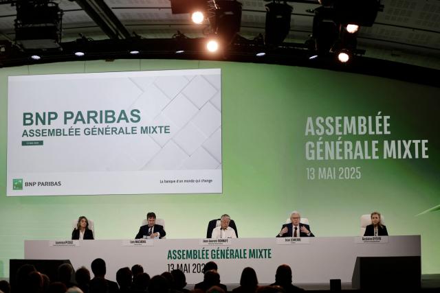BNP Paribas Chairman of the Board of Directors Jean Lemierre (2ndR) speaks next to Director of Social and Environmental Responsibility Laurence Pessez (L), financial director Lars Machenil (2ndL), CEO Jean-Laurent Bonnafe (3rdL) and assembly's secretary Guylaine Dyevre (R) during the general assembly of BNP Paribas banking group in Paris on May 13, 2025. (Photo by STEPHANE DE SAKUTIN / AFP)