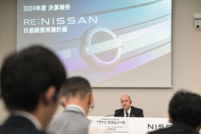 Ivan Espinosa, CEO of Japanese automaker Nissan, attends a press conference to announce the company's fiscal 2024 full-year results, at their headquarters in the city of Yokohama, Kanagawa prefecture on May 13, 2025. (Photo by Richard A. Brooks / AFP)