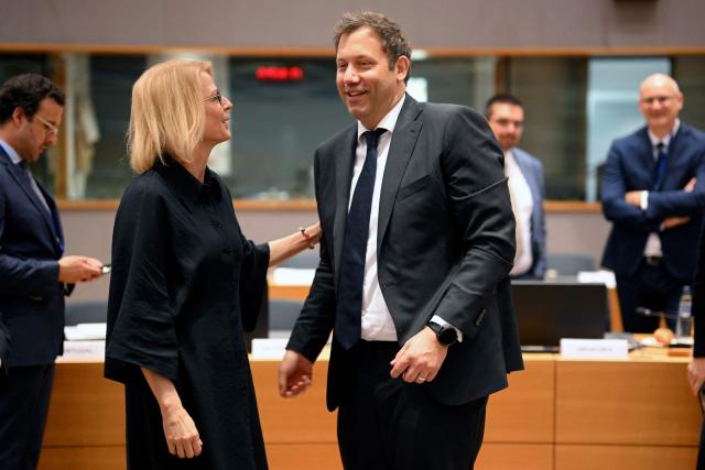 Sweden's Minister of Finance Elisabeth Svantesson talks with Germany's Minister of Finance Lars Klingbeil before a European Union (EU) Economic and Financial Affairs Council (ECOFIN) at the European Council headquarters in Brussels on May 13, 2025. (Photo by Nicolas TUCAT / AFP)