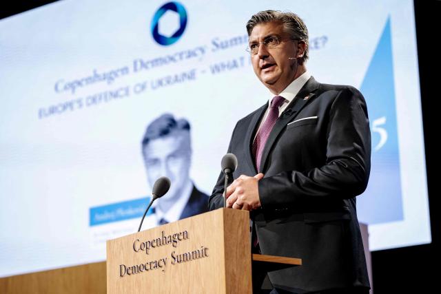 Croatia's Prime Minister Andrej Plenkovic addresses guests at the two-day Copenhagen Democracy Summit at the Royal Danish Playhouse in Copenhagen on May 13, 2025. (Photo by Mads Claus Rasmussen / Ritzau Scanpix / AFP) / Denmark OUT