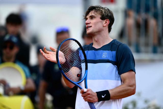 Great Britain's Jack Draper celebrates after winning against France's Corentin Moutet during their men's singles match at the ATP Rome Open tennis tournament at Foro Italico in Rome on May 13, 2025. (Photo by Marco BERTORELLO / AFP)