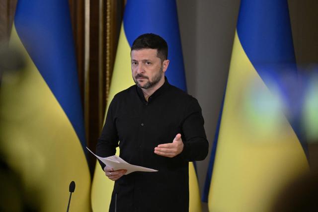 TOPSHOT - Ukraine's President Volodymyr Zelensky holds a press conference in Kyiv on May 13, 2025, amid the Russian invasion of Ukraine. Zelensky urged the United States to levy its most hard-hitting package of sanctions on Moscow if Russian President rejects a call to meet in Turkey this week. (Photo by Genya SAVILOV / AFP)