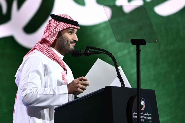 Saudi Crown Prince Mohammed bin Salman speaks during the Saudi-US investment forum at the King Abdul Aziz International Conference Center in Riyadh on May 13, 2025. Saudi Arabia on May 13 promised billions of dollars in deals with the United States from defence to artificial intelligence as it threw a lavish welcome for President Donald Trump on the first state visit of his second term. (Photo by Brendan SMIALOWSKI / AFP)