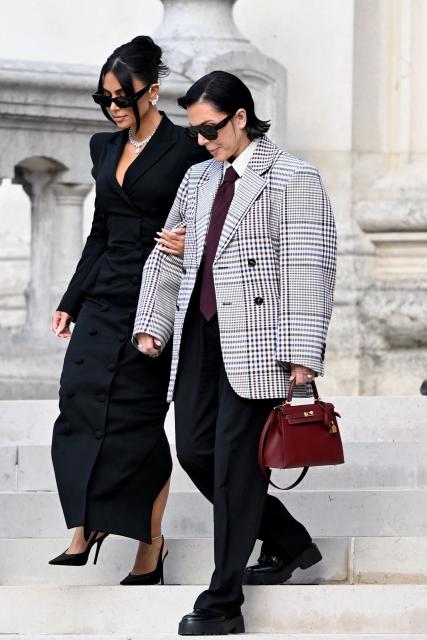 US celebrity Kim Kardashian (L) leaves with her mother Kris Jenner (R) the Assize Court after testifying in a trial over the 2016 robbery that saw her relieved of millions of dollars' worth of jewellery at gunpoint in Paris, on May 13, 2025. The trial of this sensational nine million euro jewellery robbery opened in Paris on April 28, 2025. (Photo by LEO VIGNAL / AFP)