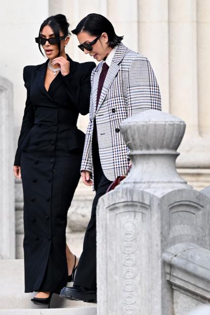 US celebrity Kim Kardashian (L) leaves with her mother Kris Jenner (R) the Assize Court after testifying in a trial over the 2016 robbery that saw her relieved of millions of dollars' worth of jewellery at gunpoint in Paris, on May 13, 2025. The trial of this sensational nine million euro jewellery robbery opened in Paris on April 28, 2025. (Photo by LEO VIGNAL / AFP)