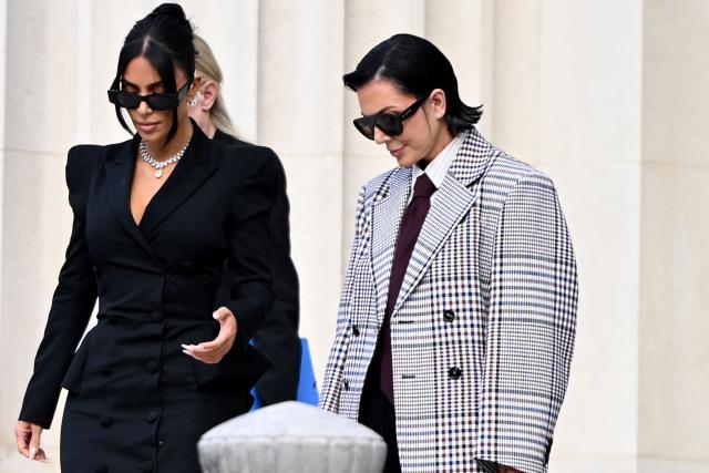 US celebrity Kim Kardashian (L) leaves with her mother Kris Jenner (R) the Assize Court after testifying in a trial over the 2016 robbery that saw her relieved of millions of dollars' worth of jewellery at gunpoint in Paris, on May 13, 2025. The trial of this sensational nine million euro jewellery robbery opened in Paris on April 28, 2025. (Photo by LEO VIGNAL / AFP)