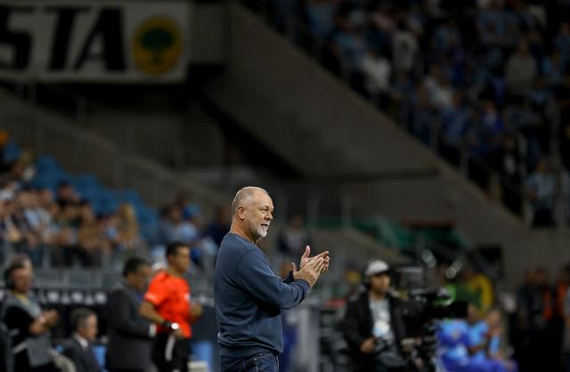 Gremio's Brazilian head coach Mano Menezes aplauds during the Copa Sudamericana group stage football match between Brazil's Gremio and Argentina's Godoy Cruz, at the Arena do Gremio stadium in Porto Alegre, state of Rio Grande do Sul, Brazil, on May 13, 2025. (Photo by SILVIO AVILA / AFP)