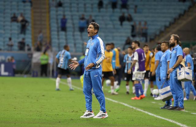 Godoy Cruz's head coach Emerson Panigutti reacts during the Copa Sudamericana group stage football match between Brazil's Gremio and Argentina's Godoy Cruz, at the Arena do Gremio stadium in Porto Alegre, state of Rio Grande do Sul, Brazil, on May 13, 2025. (Photo by SILVIO AVILA / AFP)