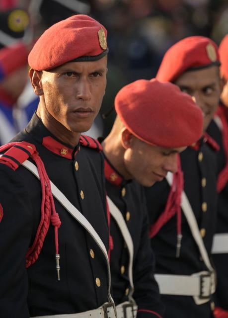 Members of the Venezuelan Army take part in a military parade during the inauguration of Victory Square, commemorating the 80th anniversary of the Soviet Union's victory over Nazi Germany in World War Two (WWII), in Caracas on May, 13, 2025. (Photo by Juan BARRETO / AFP)