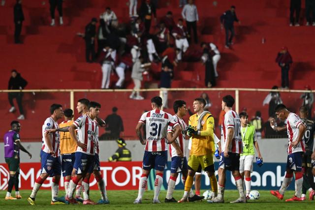 Union de Santa Fe players react after losing during the Copa Sudamericana group stage football match between Argentina's Union de Santa Fe and Ecuador's Mushuc Runa at the 15 de Abril stadium in Santa Fe, Argentina, on May 13, 2025. (Photo by Jose ALMEIDA / AFP)