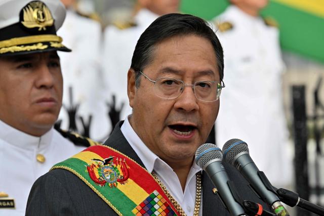 (FILES) Bolivia's President Luis Arce speaks during the commemoration of the 146th anniversary of the Battle of Calama, during a four-year war with Chile in which Bolivia lost its access to the sea, at the Eduardo Avaroa square in La Paz on March 23, 2025. Bolivia's President Luis Arce desisted on May 13, 2025, from seeking reelection in the general elections of August 2025, after being proclaimed candidate for the Movement Towards Socialism (Movimiento al Socialismo). (Photo by AIZAR RALDES / AFP)