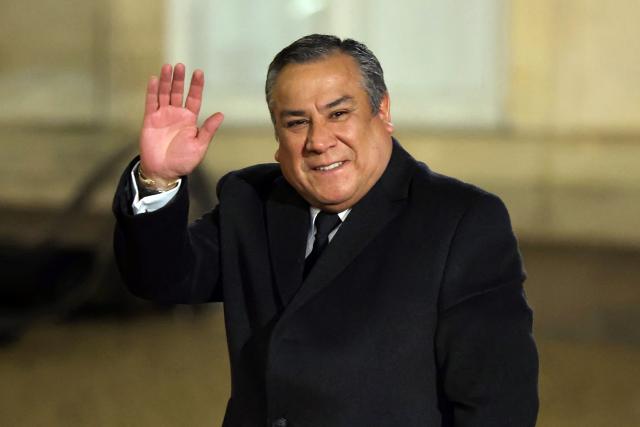 (FILES) Peru's Chief of Staff Gustavo Adrianzen arrives to attend a European heads of state meeting on the sideline of the Artificial Intelligence (AI) Action Summit, at the Elysee palace, in Paris on February 10, 2025. Peruvian Chief of Staff Gustavo Adrianzen, the most trusted man of unpopular President Dina Boluarte, resigned on May 13, 2025, before the Peruvian Congress debates a motion of censure against him. (Photo by Thomas SAMSON / AFP)