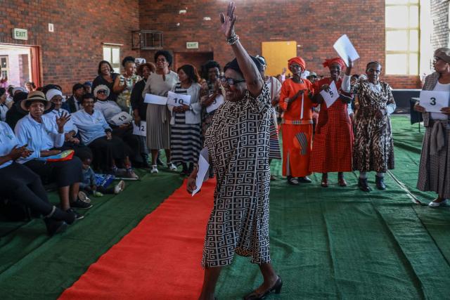 Alinah Tshonisile, 77, reacts after being announced as the runner-up in the Sukuma Mbokodo Support Group’s Elderly Beauty Contest in Thokoza on May 13, 2025. (Photo by Phill Magakoe / AFP)