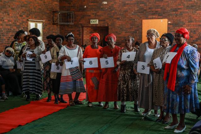 Contestants wait for the announcement of the results during the Sukuma Mbokodo Support Group’s Elderly Beauty Contest in Thokoza on May 13, 2025. (Photo by Phill Magakoe / AFP)