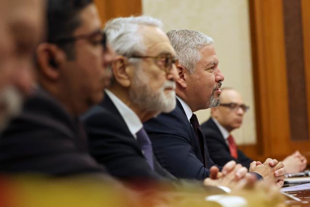 Honduras Foreign Minister Eduardo Enrique Reina (2nd-R) attends a meeting with Chinese Foreign Minister Wang Yi (not pictured) at the Diaoyutai State Guesthouse in Beijing on May 14, 2025. (Photo by FLORENCE LO / POOL / AFP)