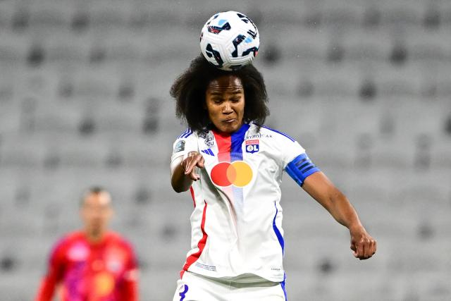 Lyon’s French defender #03 Wendie Renard heads the ball during the French D1 women's football final match between Olympique Lyonnais (OL) and Paris Saint-Germain (PSG) at the Groupama Stadium in Decines-Charpieu, central-eastern France on May 16, 2025. (Photo by OLIVIER CHASSIGNOLE / AFP)