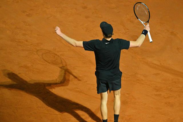 Italy's Jannik Sinner celebrates his victory during his men's singles semi-final match against USA's Tommy Paul for the ATP Rome Open tennis tournament at Foro Italico in Rome on May 16, 2025. (Photo by Andreas SOLARO / AFP)