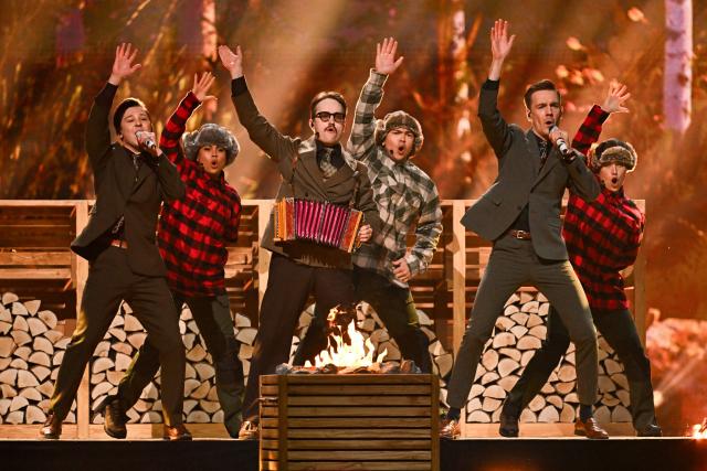 Finnishg group Kaj, representing Sweden with the song "Bara Bada Bastu”, performs during the dress rehearsal for the final of the Eurovision Song Contest 2025 at the St. Jakobshalle arena in Basel on May 16, 2025.  (Photo by Fabrice COFFRINI / AFP)