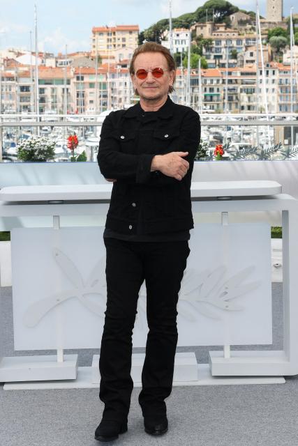 Irish singer of U2 Bono poses during a photocall for the film "Bono: Stories of Surrender" at the 78th edition of the Cannes Film Festival in Cannes, southern France, on May 17, 2025. (Photo by Sameer Al-Doumy / AFP)