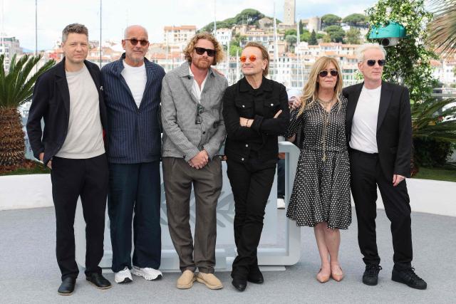 (From 2L) US producer Jon Kamen, US cinematographer Erik Messerschmidt, Irish singer of U2 Bono, US producer Dede Gardner and Irish music producer Jacknife Lee pose during a photocall for the film "Bono: Stories of Surrender" at the 78th edition of the Cannes Film Festival in Cannes, southern France, on May 17, 2025. (Photo by Sameer Al-Doumy / AFP)