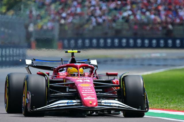 Ferrari's British driver Lewis Hamilton races during a practice session for the 2025 Emilia Romagna Formula One Grand Prix at the Imola autodrome in Imola, on May 17, 2025. (Photo by Andrej ISAKOVIC / AFP)