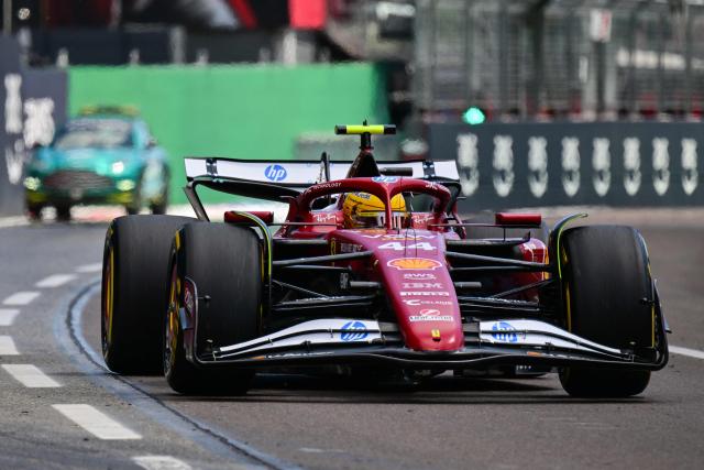 Ferrari's British driver Lewis Hamilton races during a practice session for the 2025 Emilia Romagna Formula One Grand Prix at the Imola autodrome in Imola, on May 17, 2025. (Photo by Andrej ISAKOVIC / AFP)