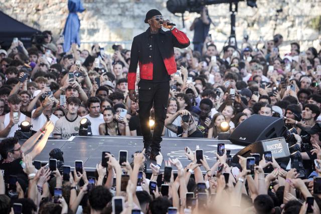 (FILES) Werenoi performs on stage during the 40th edition of the Francofolies de La Rochelle music festival, in La Rochelle, southwestern France, on July 13, 2024. French hip-hop artist Werenoi, France's number one album seller in 2023 and 2024, has died at the age of 31, his producer announced on social network X on May 17, 2025. (Photo by Thibaud MORITZ / AFP)