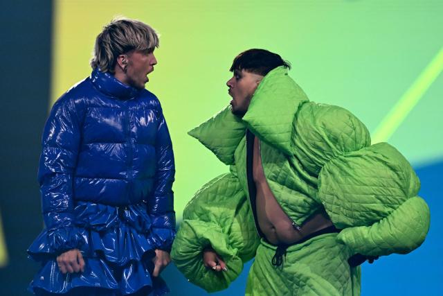 Croatian singer Baby Lasagna (L) and Finnish singer Käärijä perform during the grand final of the Eurovision Song Contest 2025, at the St. Jakobshalle arena in Basel on May 17, 2025. (Photo by Fabrice COFFRINI / AFP)
