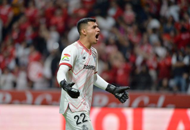 Toluca's goalkeeper #22 Luis Garcia celebrates his team's first goal during the Liga MX Clausura tournament semi-final second leg football match between Toluca and Tigres at the Nemesio Diez Stadium in Toluca, Mexico on May 17, 2025. (Photo by Mario Vazquez / AFP)