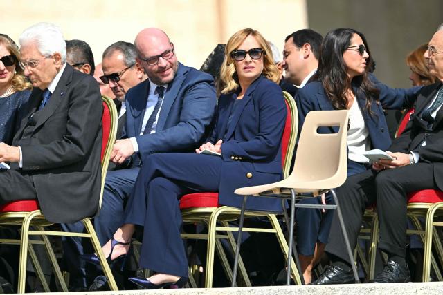 Italy's Prime Minister Giorgia Meloni (C) looks on ahead a Holy Mass for the Beginning of the Pontificate of Pope Leo XIV, in St Peter's square in The Vatican on May 18, 2025. (Photo by Alberto PIZZOLI / AFP)
