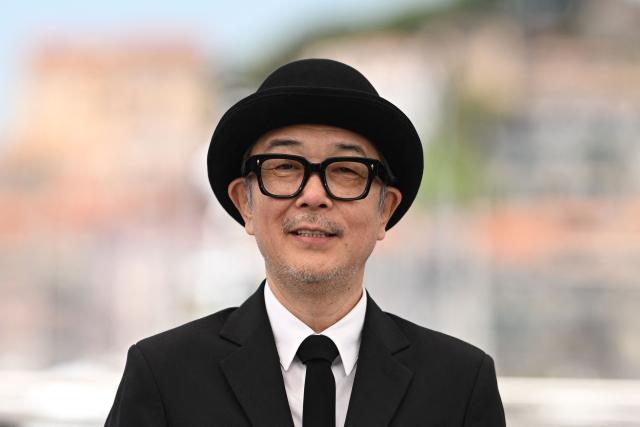 Japanese actor and writer Lily Franky poses during a photocall for the film "Runowaru" (Renoir) at the 78th edition of the Cannes Film Festival in Cannes, southern France, on May 18, 2025. (Photo by Miguel Medina / AFP)