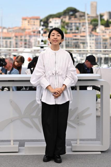 Unknown and Japanese director and screenwriter Chie Hayakawa poses during a photocall for the film "Runowaru" (Renoir) at the 78th edition of the Cannes Film Festival in Cannes, southern France, on May 18, 2025. (Photo by Miguel MEDINA / AFP)