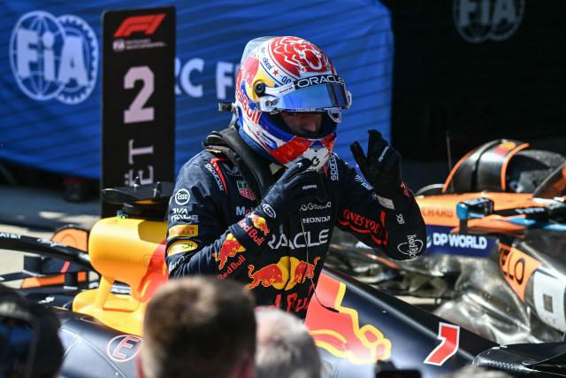 Red Bull Racing's Dutch driver Max Verstappen celebrates after winning the 2025 Emilia Romagna Formula One Grand Prix at the Imola autodrome in Imola, on May 18, 2025. (Photo by Andrej ISAKOVIC / AFP)