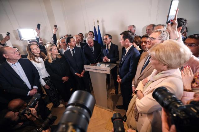 France's Interior Minister Bruno Retailleau (C) addresses party members at French right wing party Les Republicains (LR) headquarters following his election as LR's president in Paris on May 18, 2025. (Photo by Kiran RIDLEY / AFP)