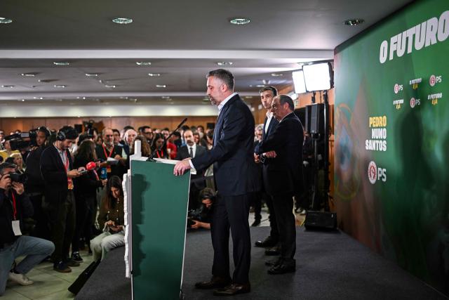 Portuguese Socialist Party leader Pedro Nuno Santos (C) delivers a speech during the election night in Lisbon early on May 19, 2025. The leader of Portugal's opposition Socialist Party said early today that he would step down after his group suffered a drubbing in a weekend general election. (Photo by Patricia DE MELO MOREIRA / AFP)