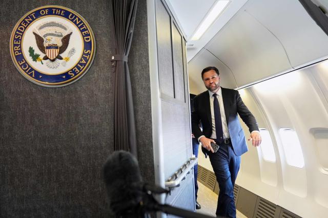 Vice President JD Vance talks to reporters on board of the Air Force Two at Leonardo da Vinci International Airport, in Rome, on May 19, 2025, after attending the inauguration of Pope Leo XIV at the Vatican. (Photo by Jacquelyn Martin / POOL / AFP)