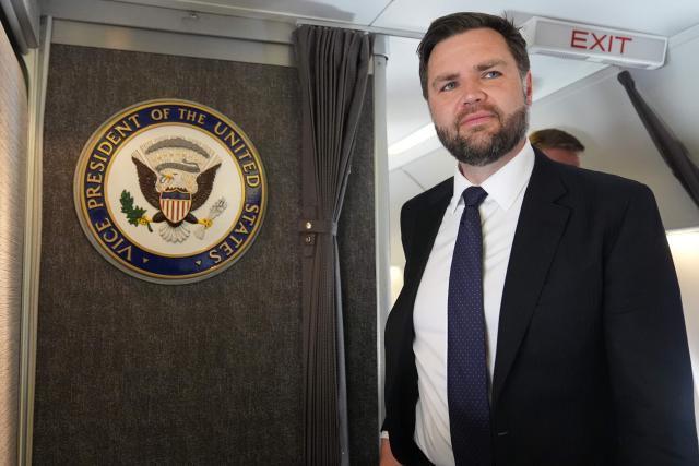 Vice President JD Vance talks to reporters on board of the Air Force Two at Leonardo da Vinci International Airport, in Rome, on May 19, 2025, after attending the inauguration of Pope Leo XIV at the Vatican. (Photo by Jacquelyn Martin / POOL / AFP)