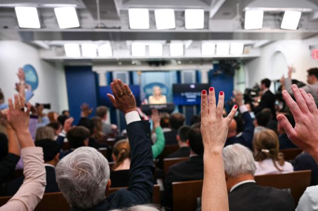 Reporters raise their hands to ask questions as White House Press Secretary Karoline Leavitt speaks during the daily briefing in the Brady Briefing Room of the White House in Washington, DC, on May 19, 2025. (Photo by Jim WATSON / AFP)