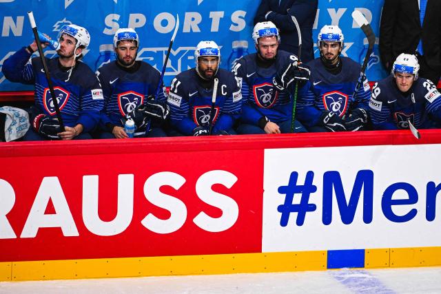 France’s players react during the IIHF Men's Ice hockey World Championship match between France and Slovenia in Stockholm, on May 19, 2025. (Photo by Jonathan NACKSTRAND / AFP)