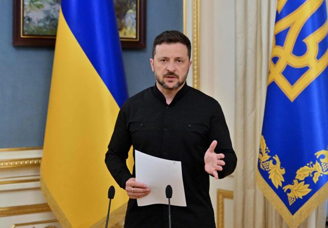 Ukraine's President Volodymyr Zelensky speaks to media during a press briefing over his phone talks with the US president, in Kyiv, on May 19, 2025, amid the Russian invasion on Ukraine. The United States has agreed to "tightly coordinate" Ukraine talks with European partners following a call between US President Donald Trump and his Russian counterpart Vladimir Putin, the German government said on May 19. Immediately after his conversation with Putin, Trump held a second call with Ukrainian President Volodymyr Zelensky, and the leaders of France, Finland, Germany, and the EU Commission. (Photo by Sergei SUPINSKY / AFP)