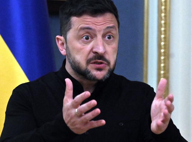 Ukraine's President Volodymyr Zelensky speaks to the media during a press briefing after his phone talks with the US president, in Kyiv, on May 19, 2025, amid the Russian invasion on Ukraine. The United States has agreed to "tightly coordinate" Ukraine talks with European partners following a call between US President Donald Trump and his Russian counterpart Vladimir Putin, the German government said on May 19. Immediately after his conversation with Putin, Trump held a second call with Ukrainian President Volodymyr Zelensky, and the leaders of France, Finland, Germany, and the EU Commission. (Photo by Sergei SUPINSKY / AFP)