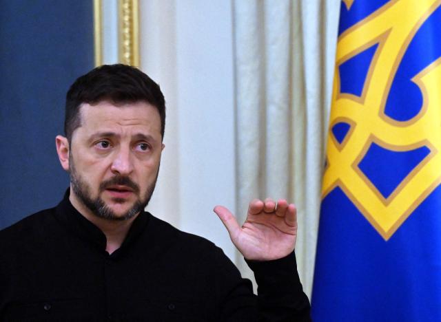 Ukraine's President Volodymyr Zelensky speaks to the media during a press briefing after his phone talks with the US president, in Kyiv, on May 19, 2025, amid the Russian invasion on Ukraine. The United States has agreed to "tightly coordinate" Ukraine talks with European partners following a call between US President Donald Trump and his Russian counterpart Vladimir Putin, the German government said on May 19. Immediately after his conversation with Putin, Trump held a second call with Ukrainian President Volodymyr Zelensky, and the leaders of France, Finland, Germany, and the EU Commission. (Photo by Sergei SUPINSKY / AFP)