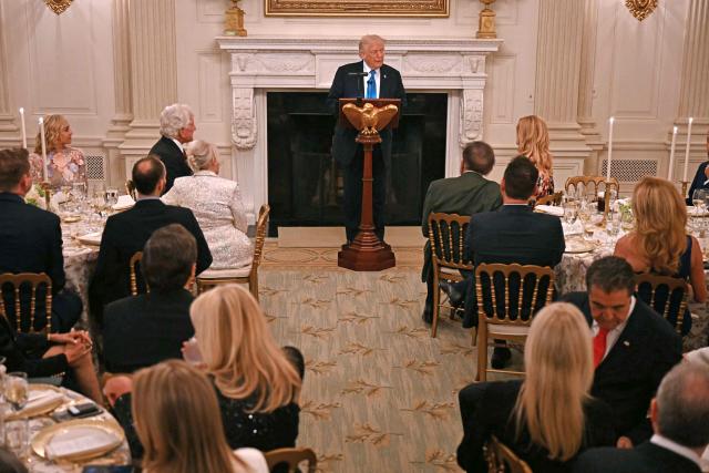US President Donald Trump speaks during a Kennedy Center Board dinner in the State Dining Room of the White House in Washington, DC, on May 19, 2025. (Photo by Jim WATSON / AFP)