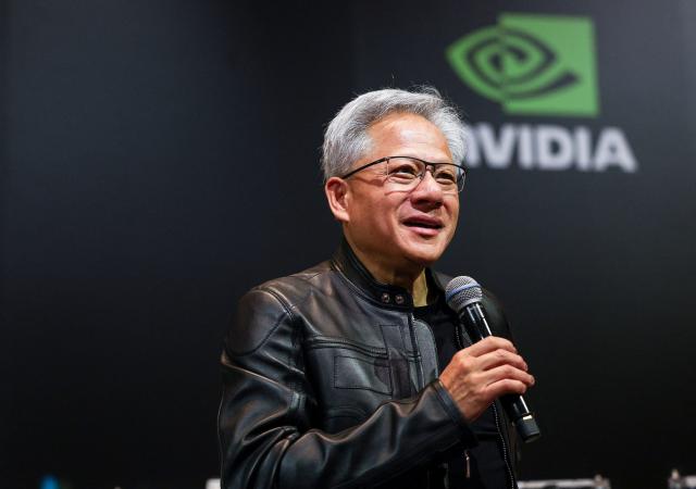Jensen Huang, co-founder and CEO of Nvidia Corp., speaks during a news conference in Taipei on May 21, 2025. Huang said that US export controls on artificial intelligence chips to China had failed, with companies using locally developed technology. (Photo by I-Hwa Cheng / AFP)