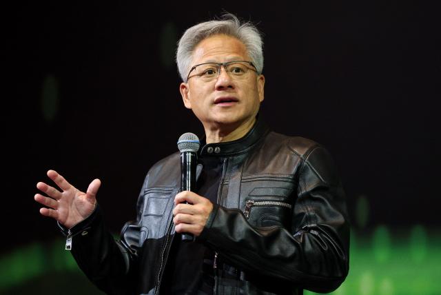 Jensen Huang, co-founder and CEO of Nvidia Corp., speaks during a news conference in Taipei on May 21, 2025. Huang said that US export controls on artificial intelligence chips to China had failed, with companies using locally developed technology. (Photo by I-Hwa Cheng / AFP)