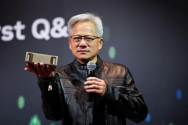 Jensen Huang, co-founder and CEO of Nvidia Corp., speaks during a news conference in Taipei on May 21, 2025. Huang said that US export controls on artificial intelligence chips to China had failed, with companies using locally developed technology. (Photo by I-Hwa Cheng / AFP)