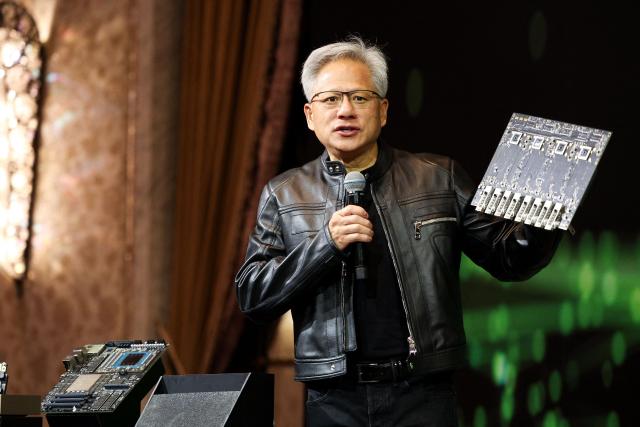 Jensen Huang, co-founder and CEO of Nvidia Corp., speaks during a news conference in Taipei on May 21, 2025. Huang said that US export controls on artificial intelligence chips to China had failed, with companies using locally developed technology. (Photo by I-Hwa Cheng / AFP)