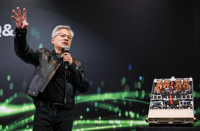 Jensen Huang, co-founder and CEO of Nvidia Corp., speaks during a news conference in Taipei on May 21, 2025. Huang said that US export controls on artificial intelligence chips to China had failed, with companies using locally developed technology. (Photo by I-Hwa Cheng / AFP)